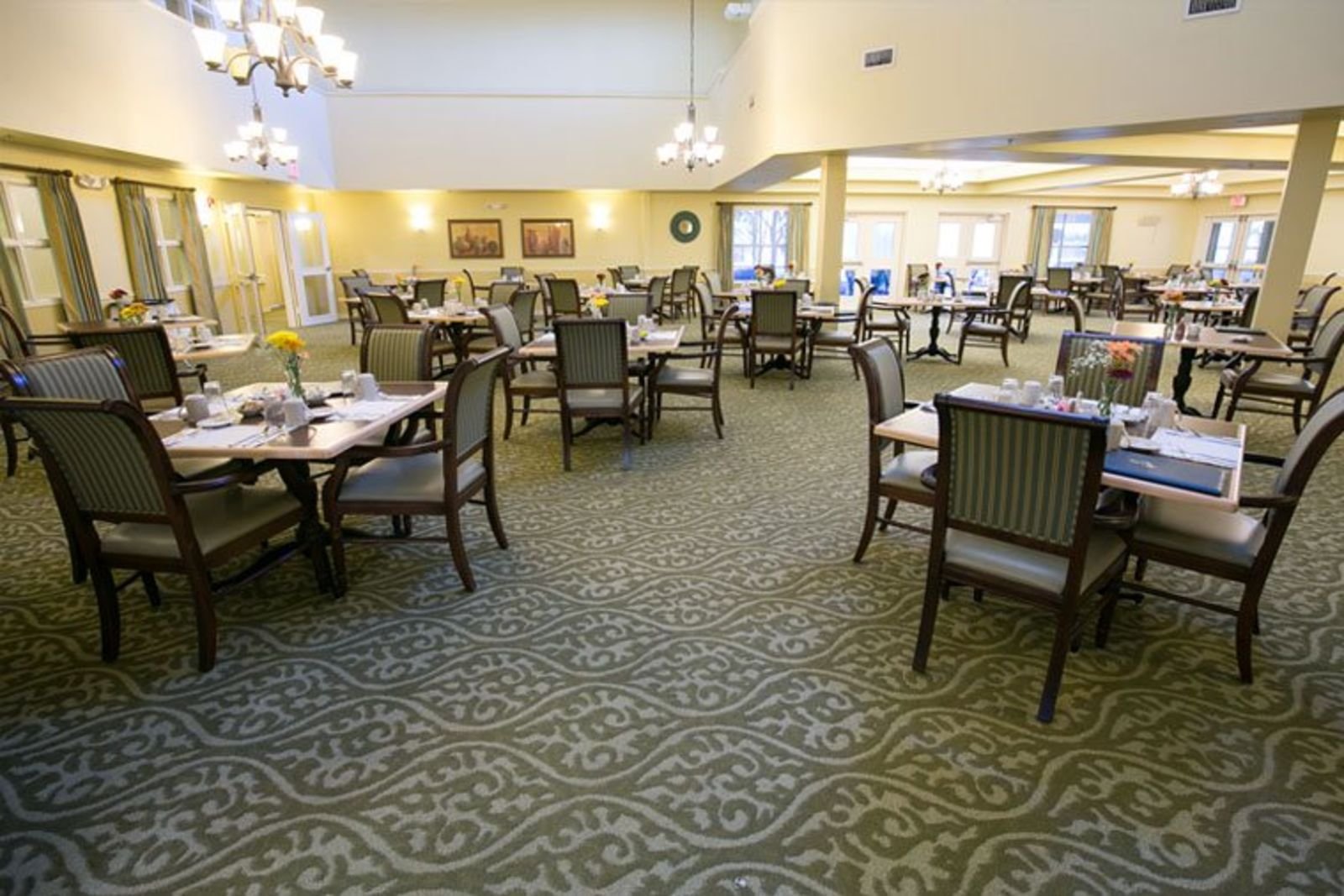 Dining room with set tables and chairs